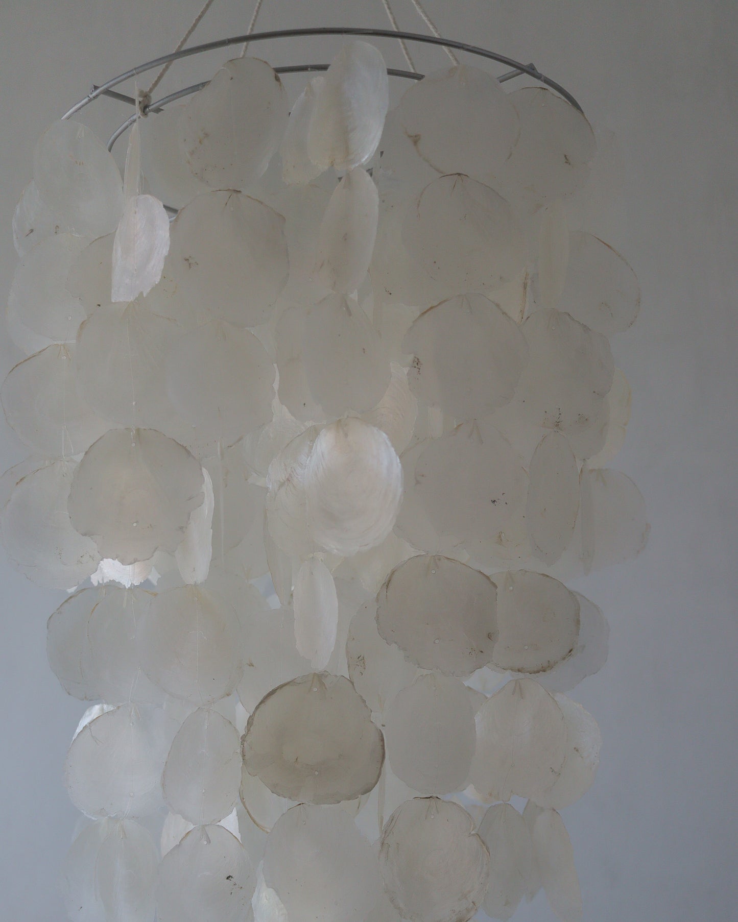 Capiz Shell Chandelier in natural shape, diameter 30 cm, handmade in Bali, Indonesia for customizable home decor.