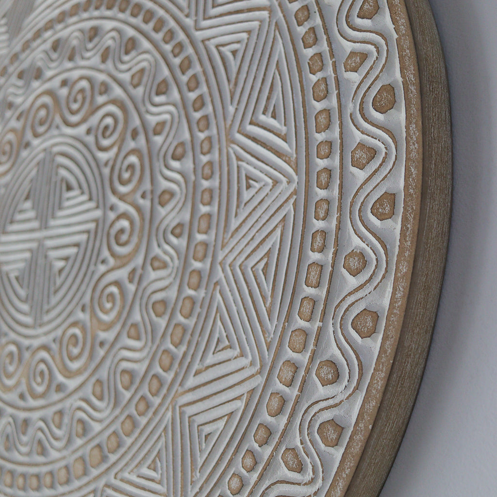 Hand carved wall panel decoration with ethnic floral patterns, handcrafted in Bali, Indonesia.
