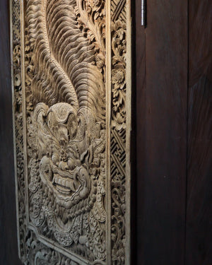 Hand-carved Balinese wood wall panel with intricate floral and mythological motifs