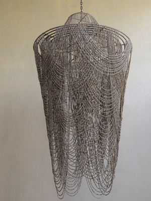 Balinese chandelier with cascading brown beads and intricate handcrafted design