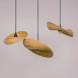 Modern bamboo pendant lamps with unique curved shades, eco-friendly lighting decor