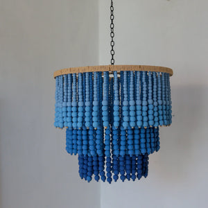 Handmade blue beaded chandelier with tiered wood beads, coastal boho home decor