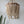 Handcrafted beige beaded ceiling light with natural wood beads and boho decor style.