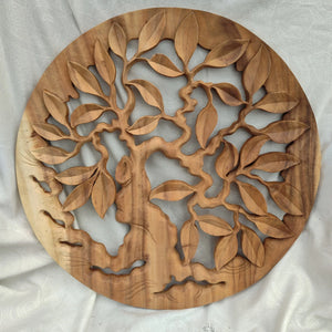Hand-carved wooden tree wall panel with natural finish and intricate leaf details
