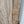 Wooden panel with intricate carvings on a white background