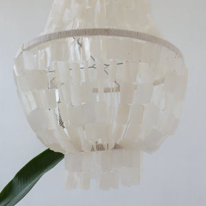 Handmade capiz shell chandelier with layered rectangular shells, modern coastal decor