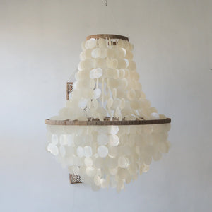 Handmade capiz shell chandelier with natural wood frame, elegant coastal decor