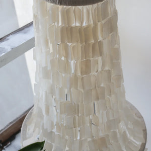 Bohemian capiz shell chandelier with layered white seashell pieces for home decor