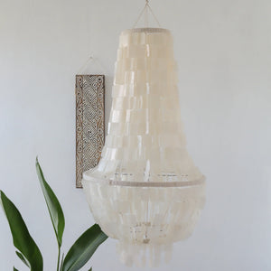 Handmade capiz shell chandelier with layered design, tropical decor, hanging indoors