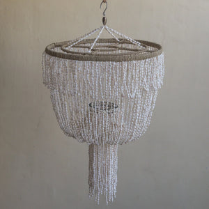 Handmade Balinese seashell chandelier with cascading white shells and natural rope accents