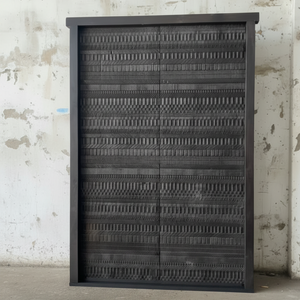 Black door with carving