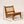 Handmade wooden lounge chair with rattan seat and backrest, modern Balinese furniture, dimensions labeled.