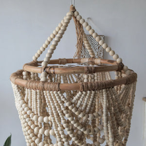 Handmade wooden bead chandelier with natural rattan frame in boho decor style