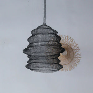 Handcrafted black wire pendant lamp with sculptural design, modern home lighting decor