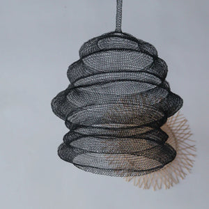 Handcrafted black wire mesh pendant light with unique spiral design, modern home decor