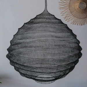 Handcrafted black wire pendant light with textured design, modern minimalist home decor