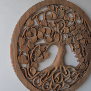 Hand-carved wooden tree of life wall art with intricate roots and branches