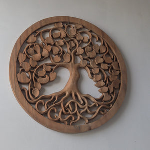 Hand-carved wood wall art with tree of life design, Balinese craftsmanship decor