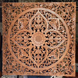 Hand-carved Balinese wood wall panel with intricate floral mandala design
