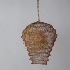 Handwoven rattan pendant light with organic shape, eco-friendly Balinese home decor