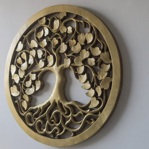 Hand-carved gold wood wall art featuring a tree of life with intricate leaves and roots