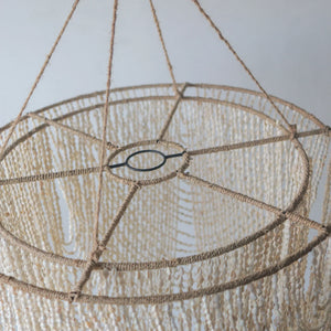 Handmade seashell chandelier with natural rope detailing, eco-friendly coastal home decor