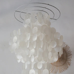 Handmade Balinese seashell chandelier with cascading white capiz shells, elegant home decor