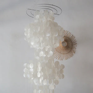 Handmade Balinese seashell chandelier with cascading white capiz shells, boho home decor