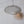 Handcrafted woven metal pendant light with scalloped edges against a white background