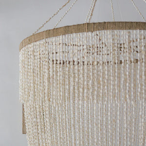 Handmade Balinese seashell chandelier with natural beads and rustic hanging design