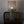 Handmade metal mesh table lamp with geometric shade on wooden chair, modern decor