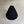 Handmade black woven pendant light with teardrop shape hanging against a neutral wall
