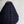 Handwoven black pendant lamp shade with natural fiber texture, hanging against a white wall