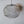 Handcrafted wire mesh pendant light with organic shape, minimalist decor background