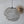 Modern wire mesh pendant lamp with sculptural design hanging in minimalist room