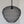 Handmade black wire pendant light with layered, organic shape against white wall
