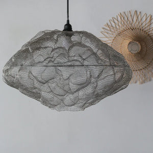 Handcrafted wire mesh pendant light with organic shape and natural boho wall decor