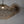Handcrafted Balinese wire mesh pendant light with woven rattan wall decor