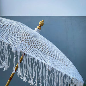 Handmade Balinese white lace parasol with wooden pole and fringe detail