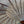 Close-up of handmade Balinese macrame parasol with natural wooden frame outdoors