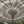 Handmade Balinese umbrella with intricate floral patterns and bamboo spokes outdoors
