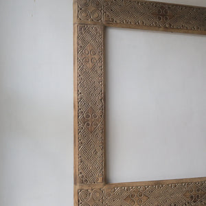 Hand carved ethnic mirror frame from Bali, handmade wooden design with unique motifs, 100 cm.