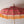 Balinese pink and gold parasol with ornate patterns and yellow fringe, handmade decor