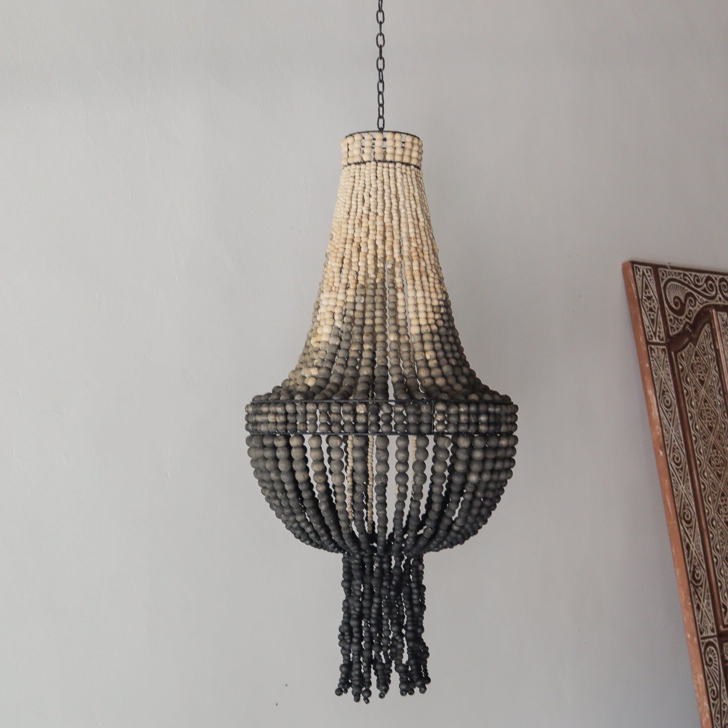 Beaded chandelier in ombre color design, handcrafted in Bali, Indonesia, showcasing elegant bead detailing.