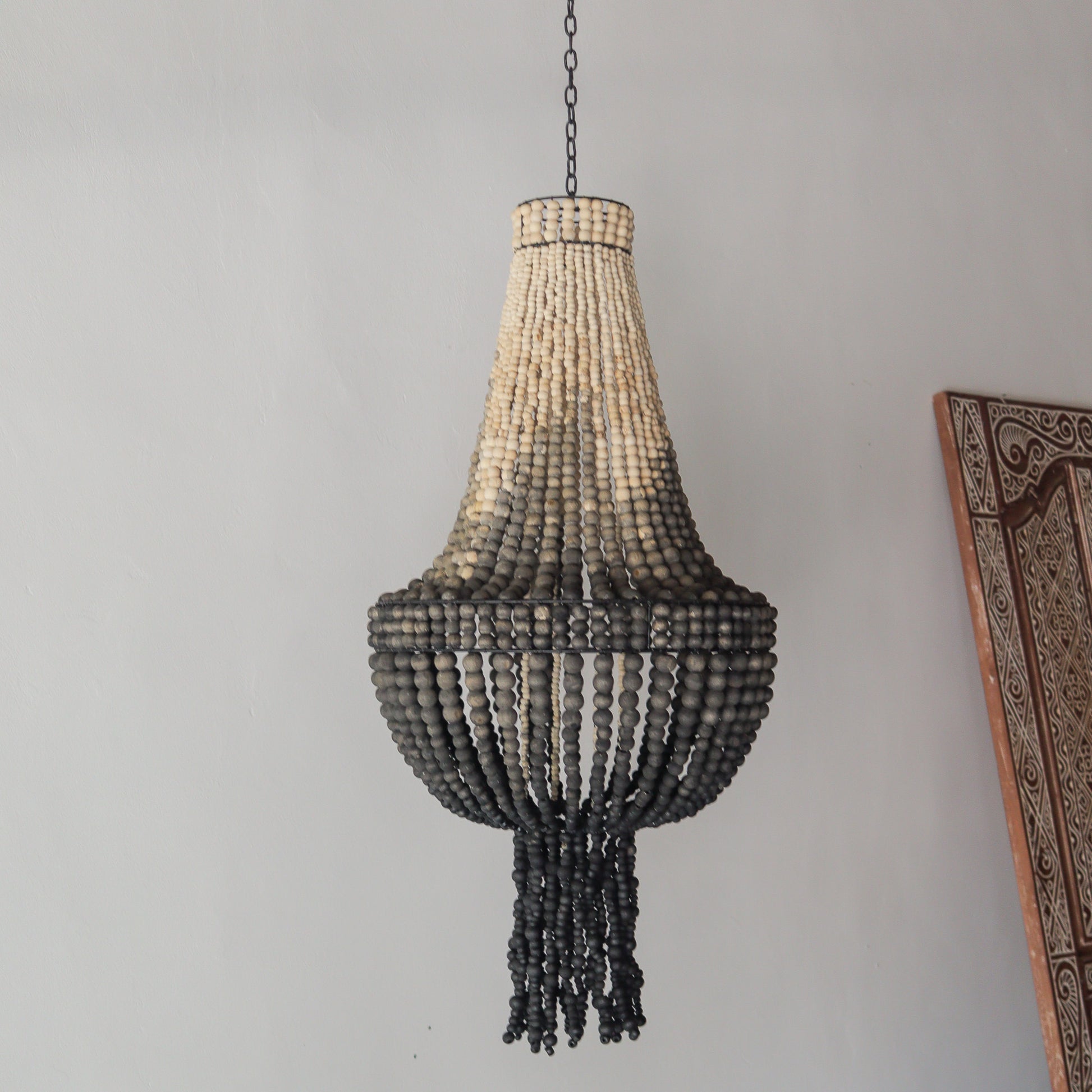 Beaded chandelier in ombre color design, handcrafted in Bali, Indonesia, showcasing elegant bead detailing.
