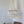 Handmade Balinese seashell chandelier hanging in a minimalist, eco-friendly interior