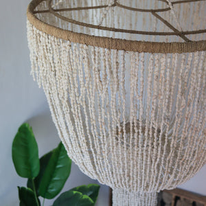 Handmade Balinese seashell chandelier with cascading beads, eco-friendly home decor