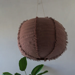 Handmade brown fabric pendant lamp with fringed seams, eco-friendly interior decor
