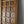Hand-carved wooden door with decorative patterns and metal studs, Balinese home decor