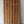 Hand-carved Balinese wooden door with decorative panel detailing and natural finish